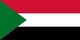 The flag of Sudan was adopted on May 20, 1970, and consists of a horizontal red-white-black tricolor, with a green triangle at the hoist. The flag is based on the Arab Liberation Flag shared by Egypt, Iraq, Syria, and Yemen, that uses a subset of the Pan-Arab colors in which green is less significant.<br/><br/>

Before the 1969 military coup of Gaafar Nimeiry, a blue-yellow-green tricolor design was used.